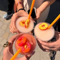 Women drinking IdaPeach wine Slushies