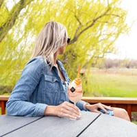Woman drinking wine slushy at Idaho Winery