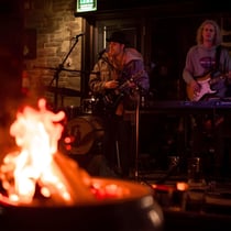 Live music by a fire at Dunning Estates