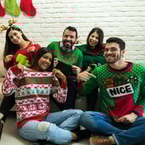 Group wearing Ugly Christmas sweaters at Cinder Winery