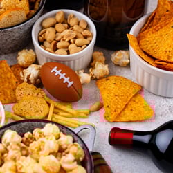 Game day snacks popcorn chips and Idaho wine