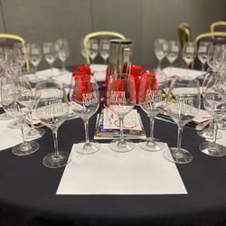 Table set with wine glasses for Idaho Wine Commission's annual meeting