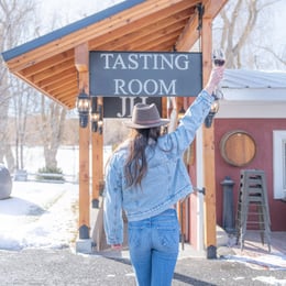 Caitlin Holesinsky walking into tasting room