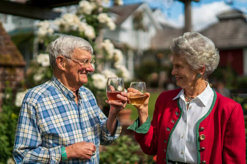 Man and woman celebrating Idaho Wine and Cider Month