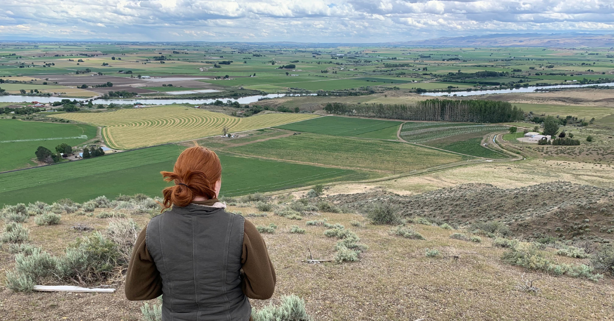 Idaho Female Vineyard Manager overseeing vineyard